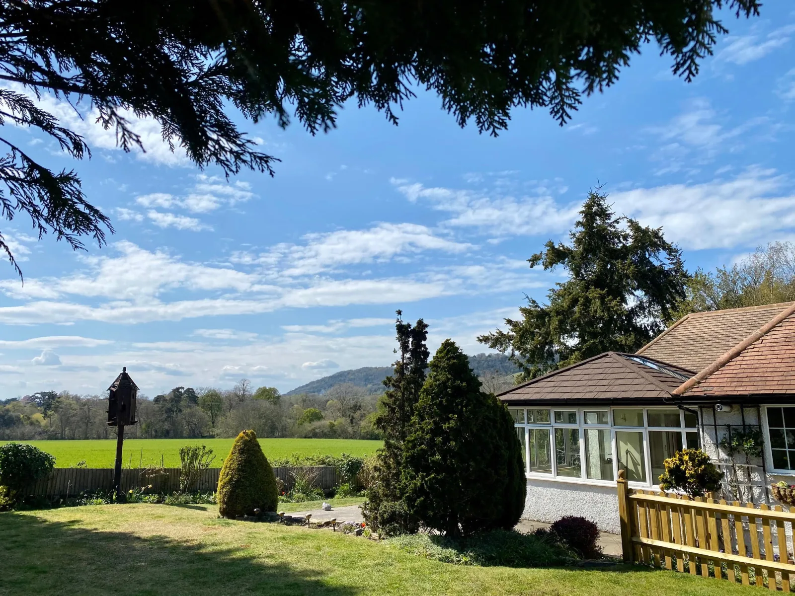 Semi-detached home with Supalite tiled conservatory roof and Sky Vista rooflight