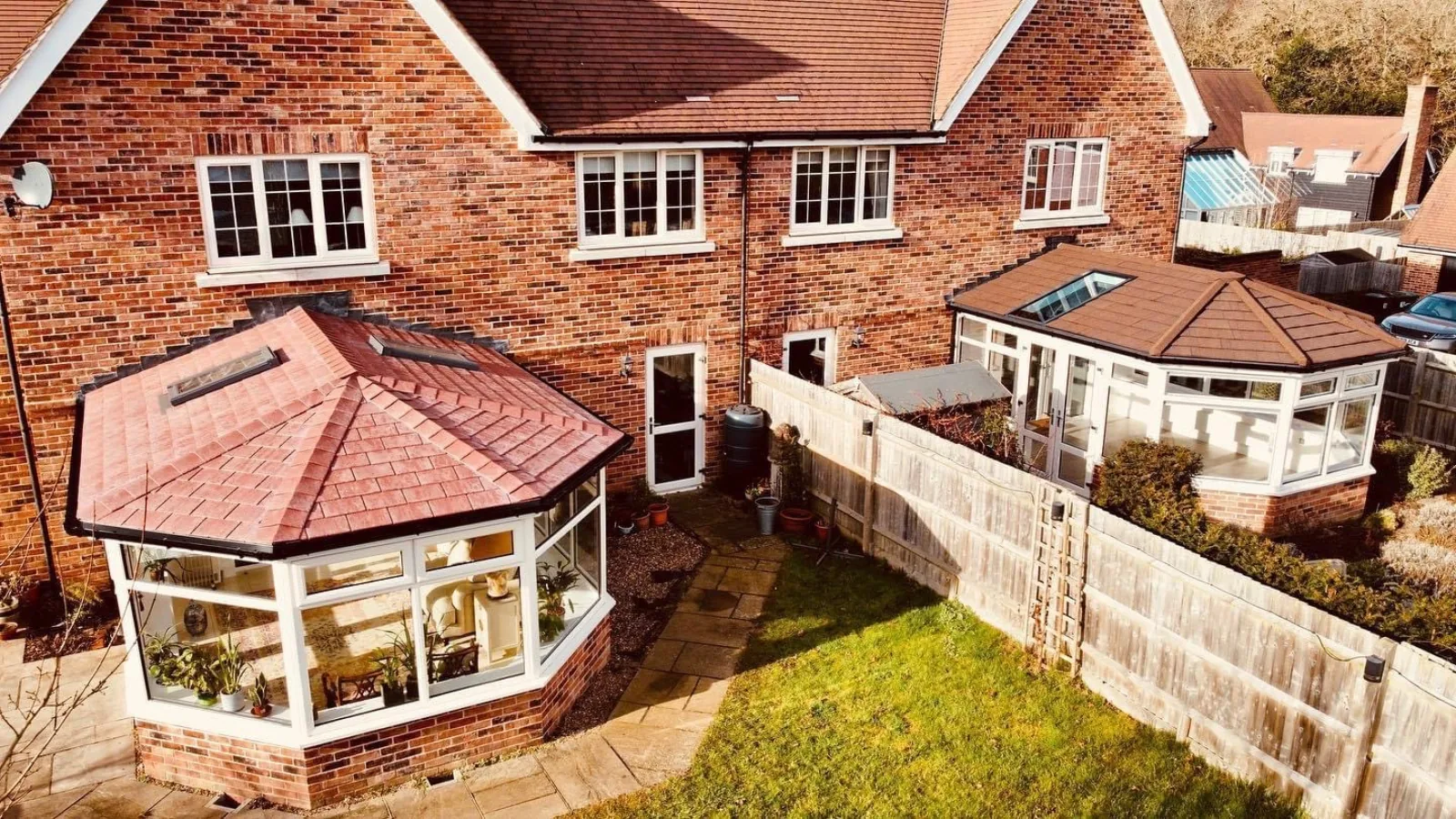1970s home with Tapco Brick Red Supalite tiled conservatory roof