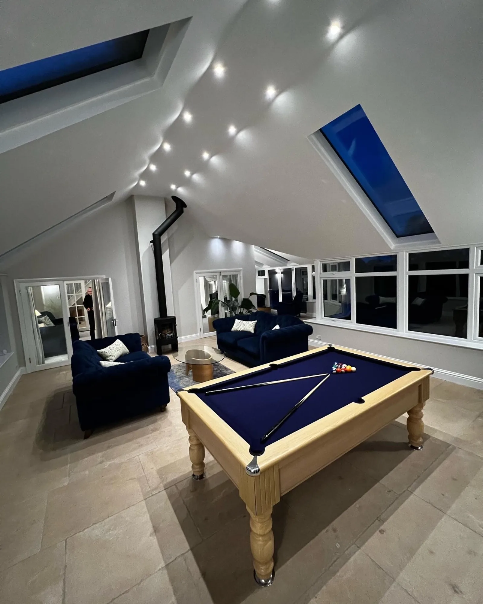 Inside a finished Supalite tiled conservatory roof — vaulted plastered ceiling with downlighters