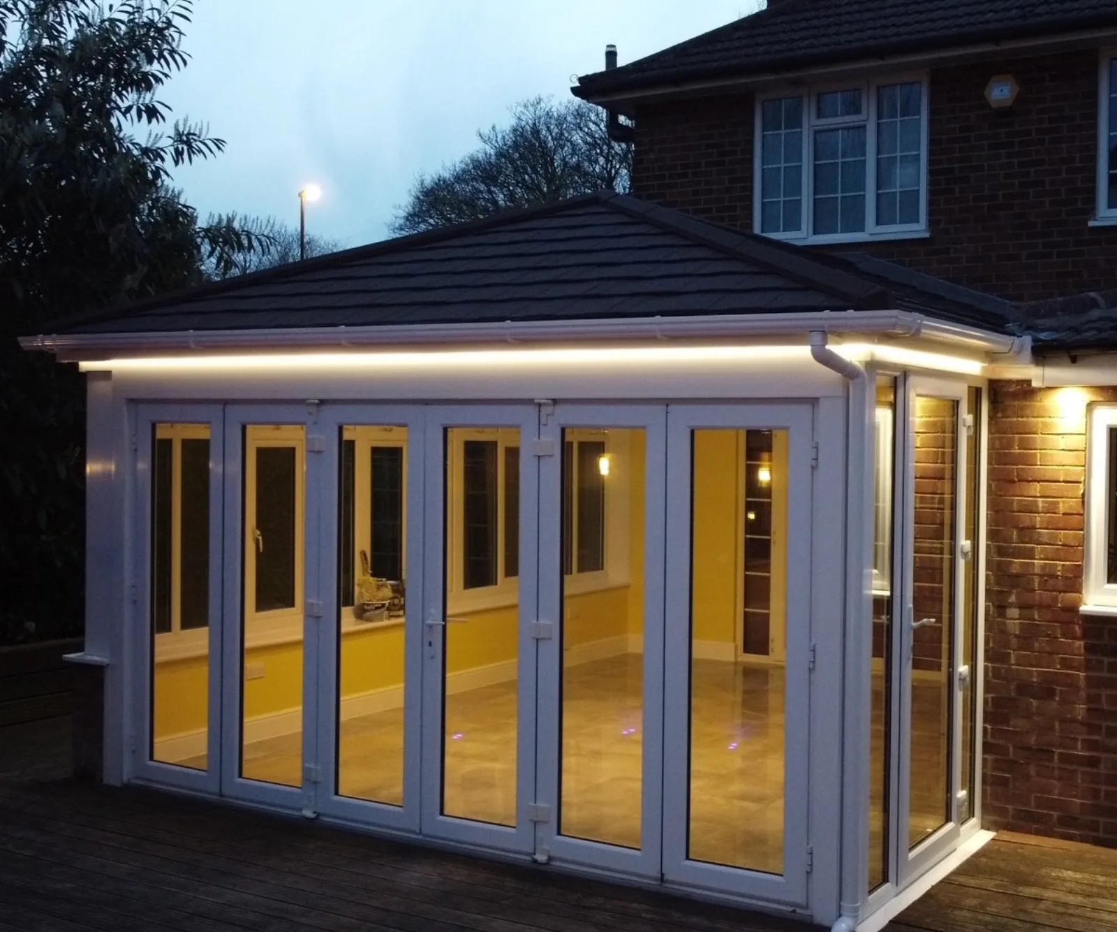 Completed Supalite tiled roof on a Greater Manchester home, exterior view at dusk